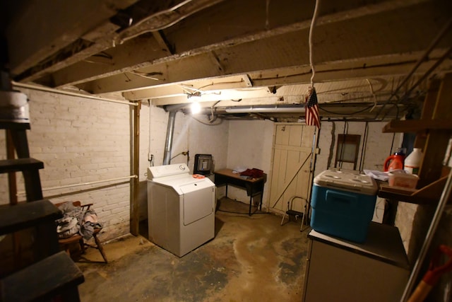 unfinished basement featuring washer / clothes dryer