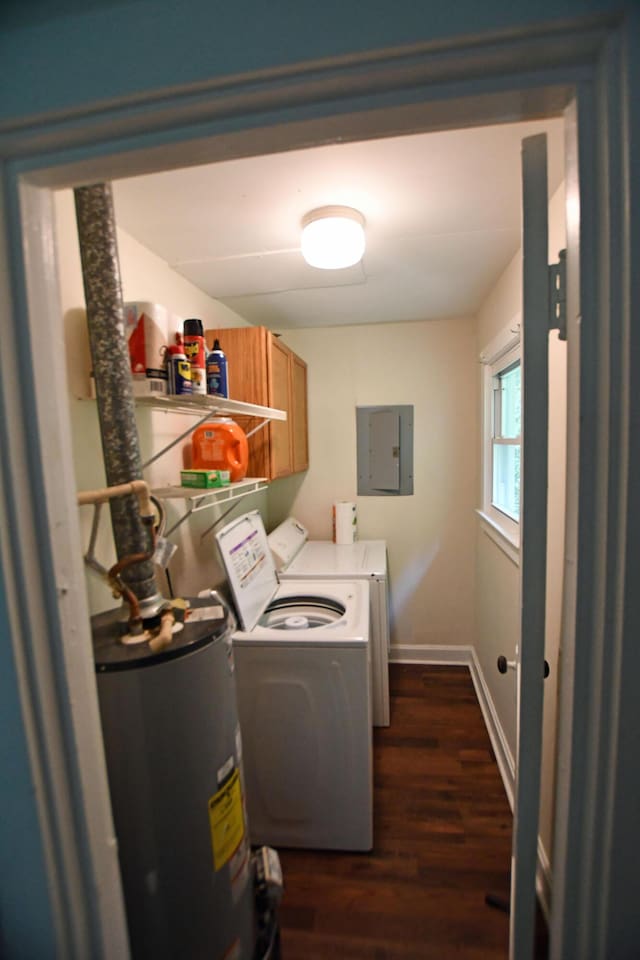 washroom featuring dark wood-style flooring, independent washer and dryer, electric panel, cabinet space, and electric water heater