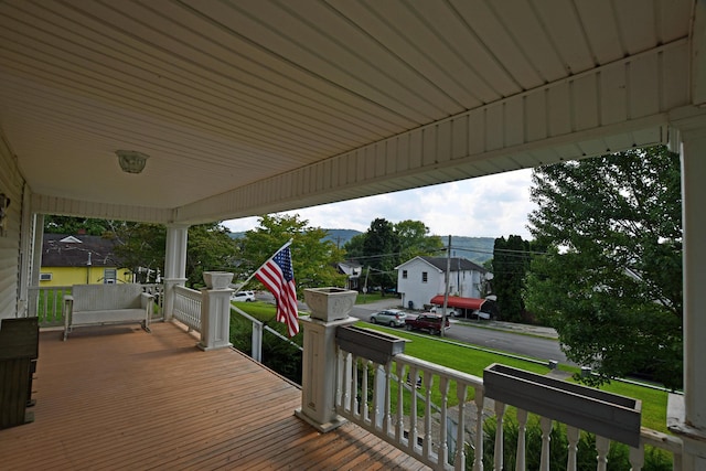 deck featuring covered porch