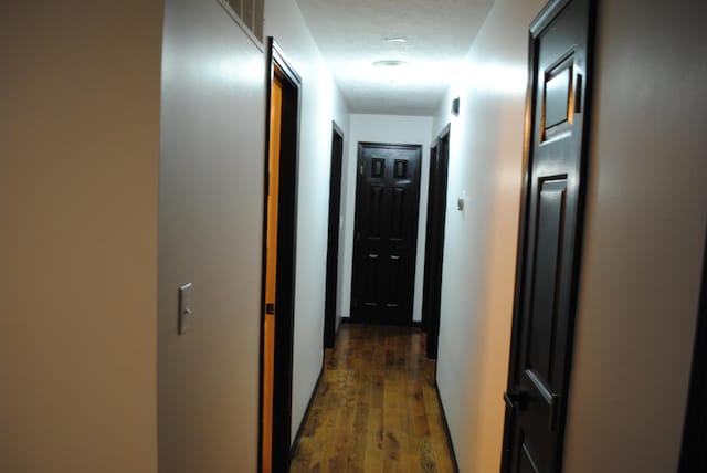 hall featuring dark hardwood / wood-style flooring