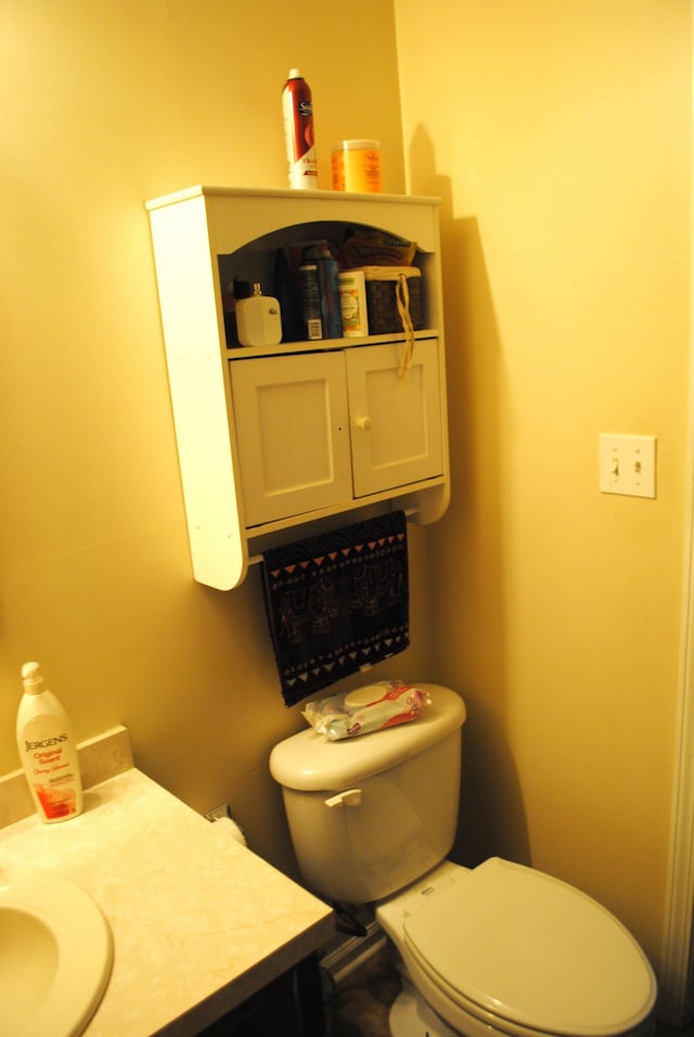 bathroom featuring sink and toilet