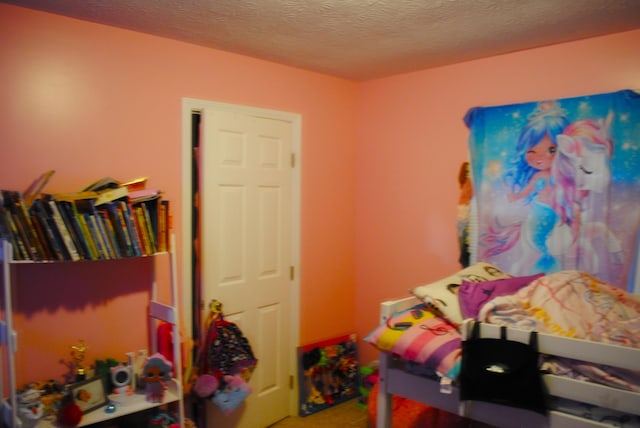 bedroom with a textured ceiling