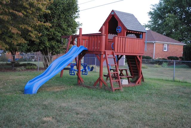 view of playground with a yard