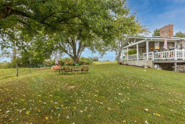 view of yard with a wooden deck