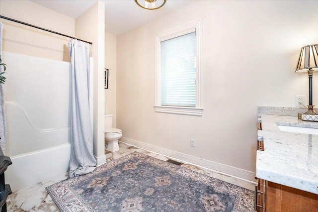 full bathroom with vanity, toilet, and shower / tub combo with curtain