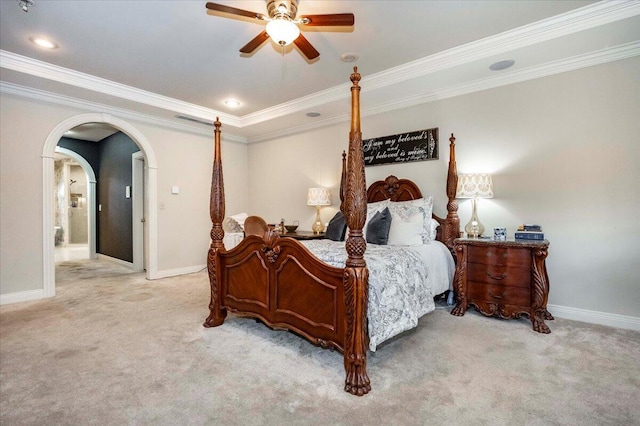 carpeted bedroom with ceiling fan and crown molding