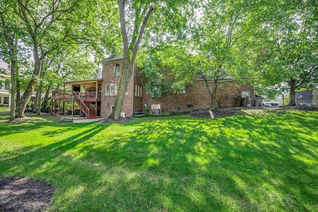 view of yard featuring a deck