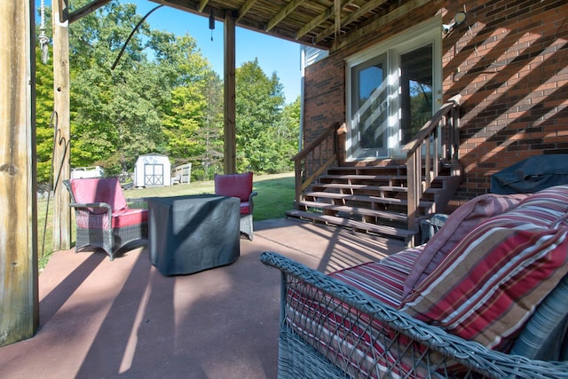 view of patio featuring a storage unit