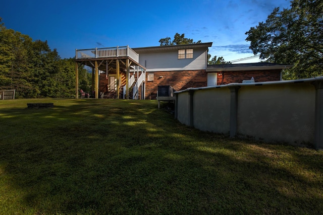 view of yard featuring a deck