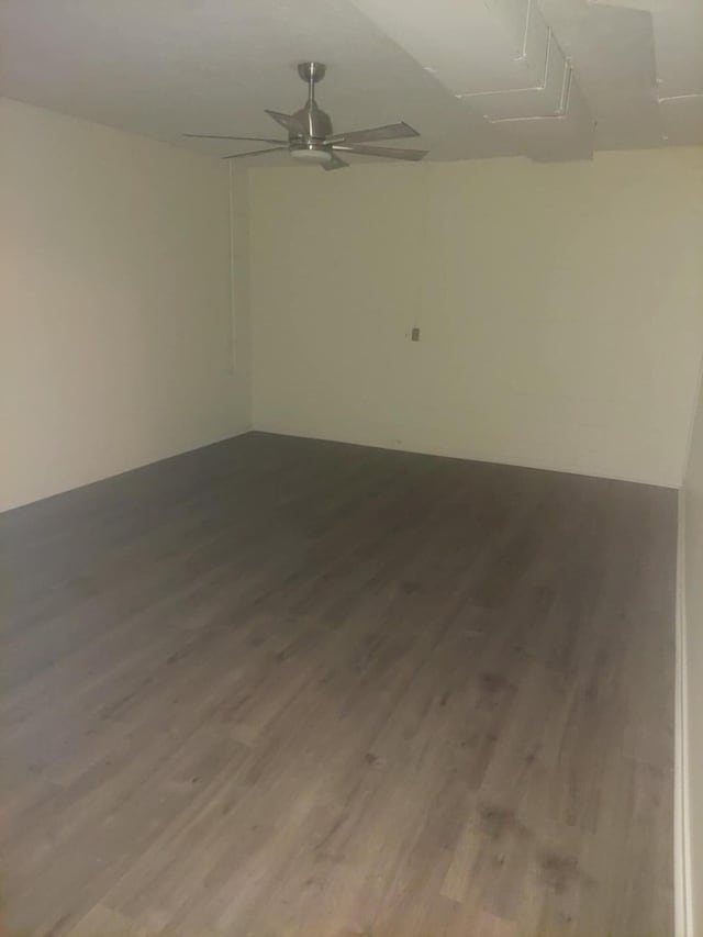 spare room featuring ceiling fan and wood-type flooring