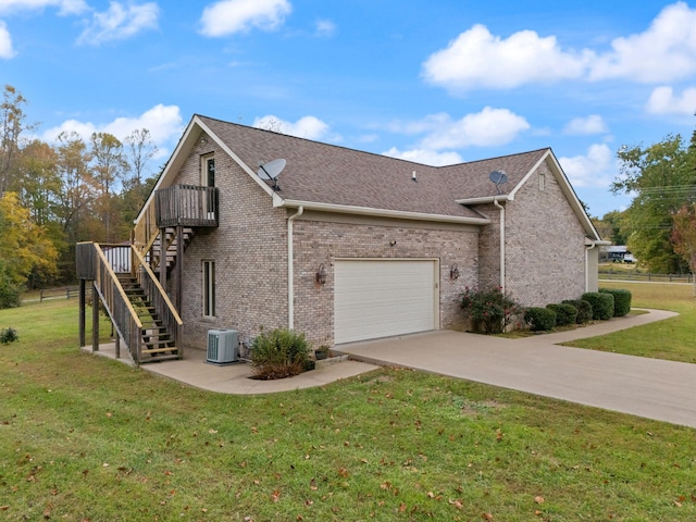 view of property exterior with central AC unit, a garage, and a lawn