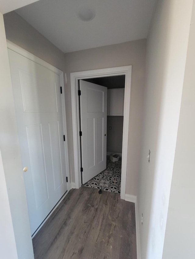 hallway featuring dark hardwood / wood-style floors