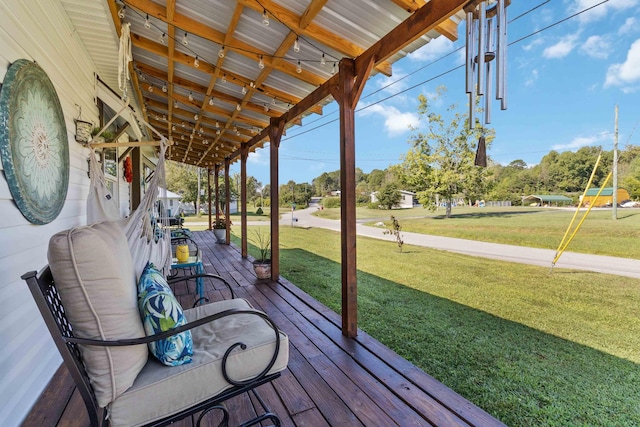 wooden deck with a yard