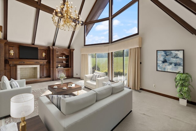 carpeted living room featuring beam ceiling, a chandelier, and high vaulted ceiling