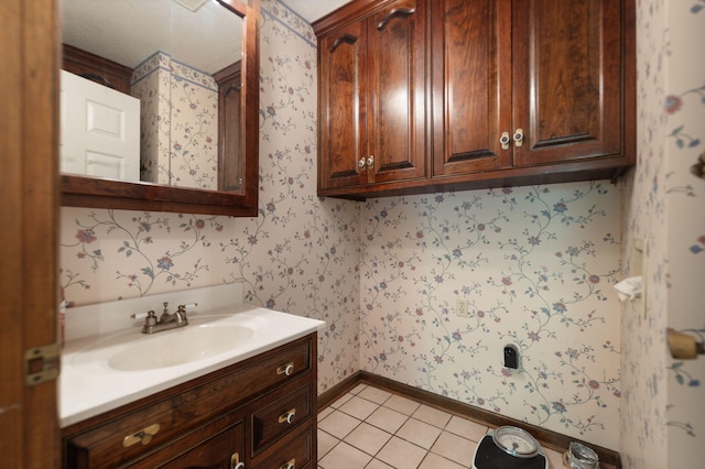 bathroom with vanity and tile patterned floors