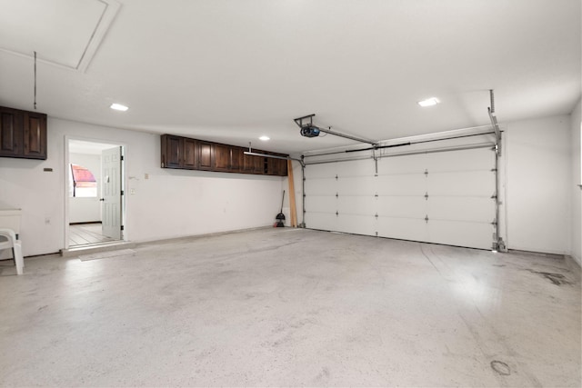 garage featuring a garage door opener