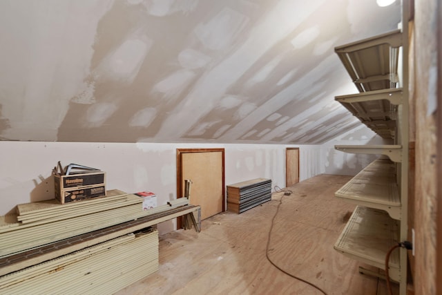 bonus room featuring lofted ceiling