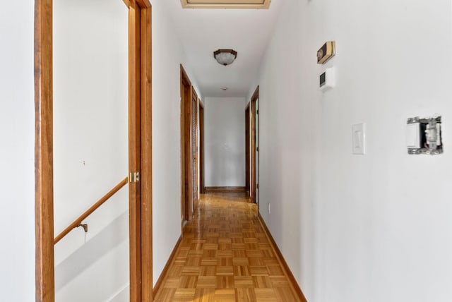 hall featuring light parquet flooring