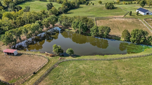 aerial view with a water view and a rural view