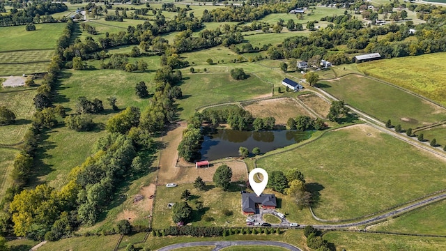 bird's eye view with a water view and a rural view