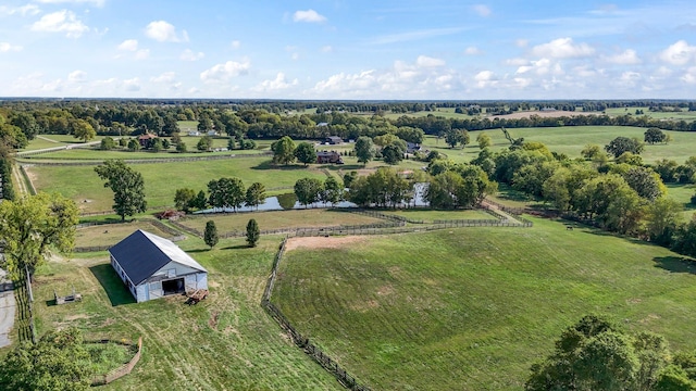 aerial view with a rural view and a water view