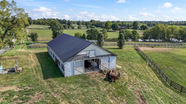 birds eye view of property featuring a rural view