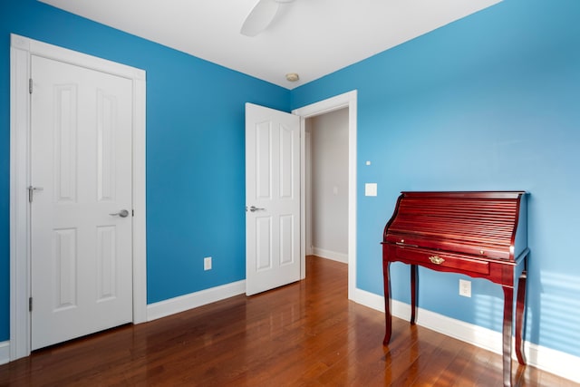 miscellaneous room with dark hardwood / wood-style flooring and ceiling fan