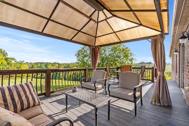 deck with an outdoor hangout area and a gazebo