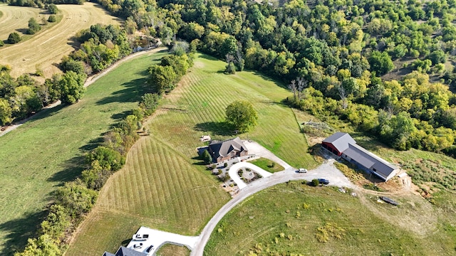 birds eye view of property featuring a rural view