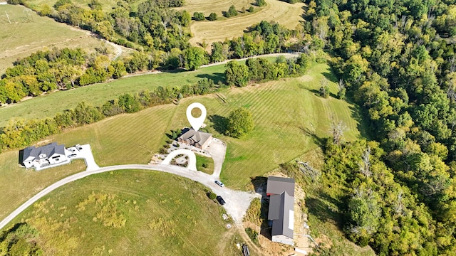 birds eye view of property featuring a rural view