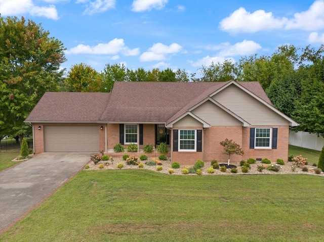 ranch-style house featuring a garage and a front lawn