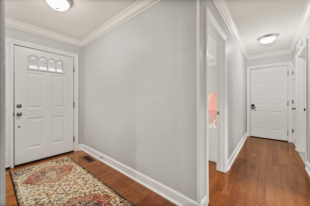 foyer featuring hardwood / wood-style floors and ornamental molding