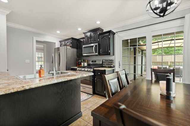 kitchen featuring crown molding, light stone countertops, appliances with stainless steel finishes, and light tile patterned flooring