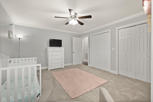 unfurnished bedroom with crown molding, ceiling fan, and light carpet