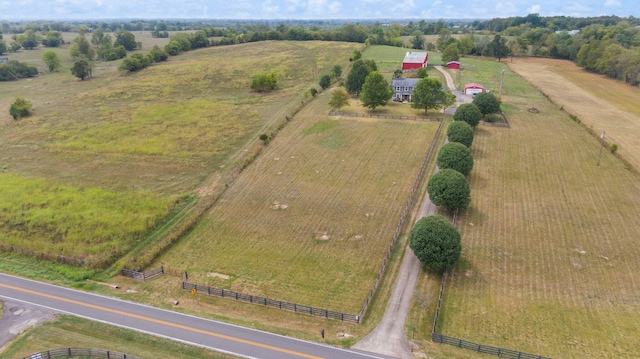 birds eye view of property featuring a rural view