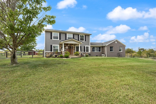 view of front of home featuring a front lawn