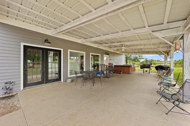 view of patio with a hot tub