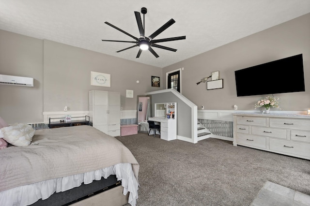 carpeted bedroom featuring a wall mounted AC, ceiling fan, and a textured ceiling