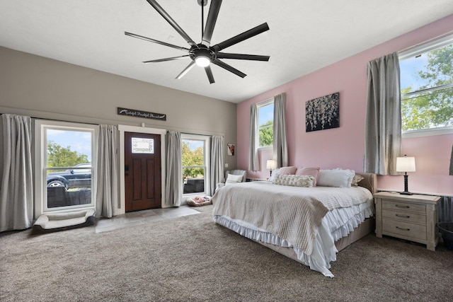 bedroom featuring ceiling fan and light carpet