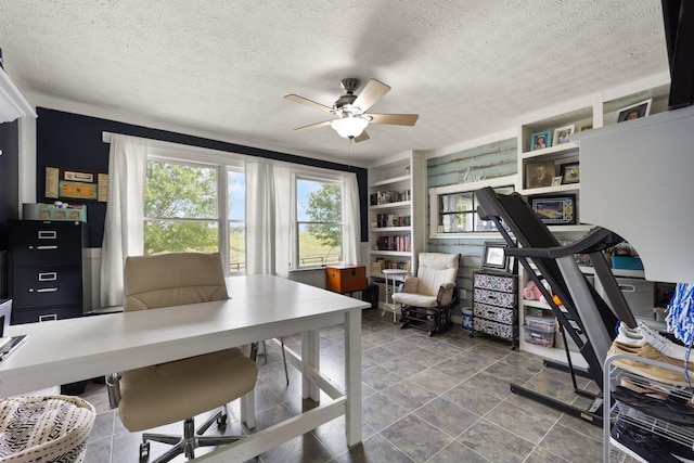 office area featuring ceiling fan and a textured ceiling