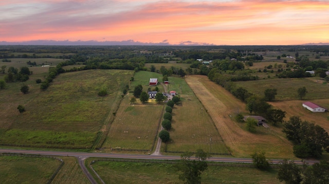 aerial view at dusk with a rural view