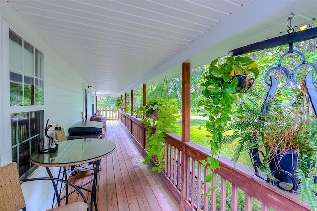 wooden terrace with covered porch