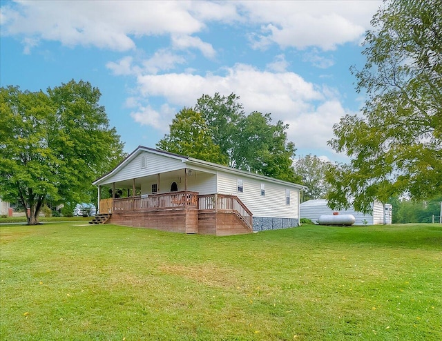 back of house with a yard