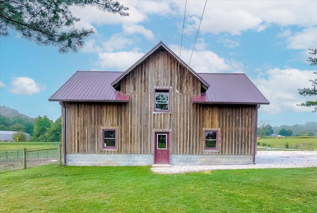 exterior space with a front yard