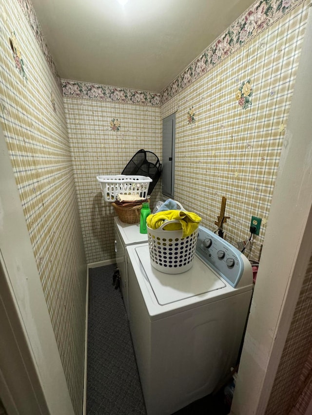 washroom featuring tile walls and separate washer and dryer