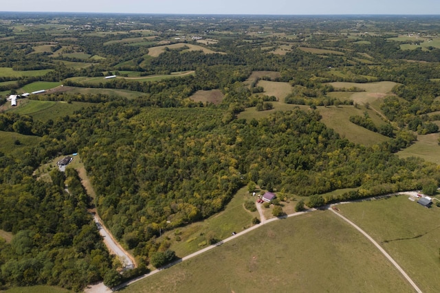 birds eye view of property featuring a rural view