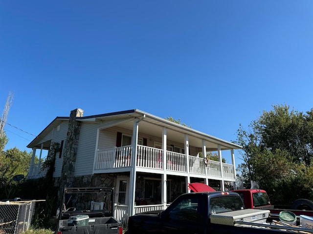 exterior space featuring a balcony