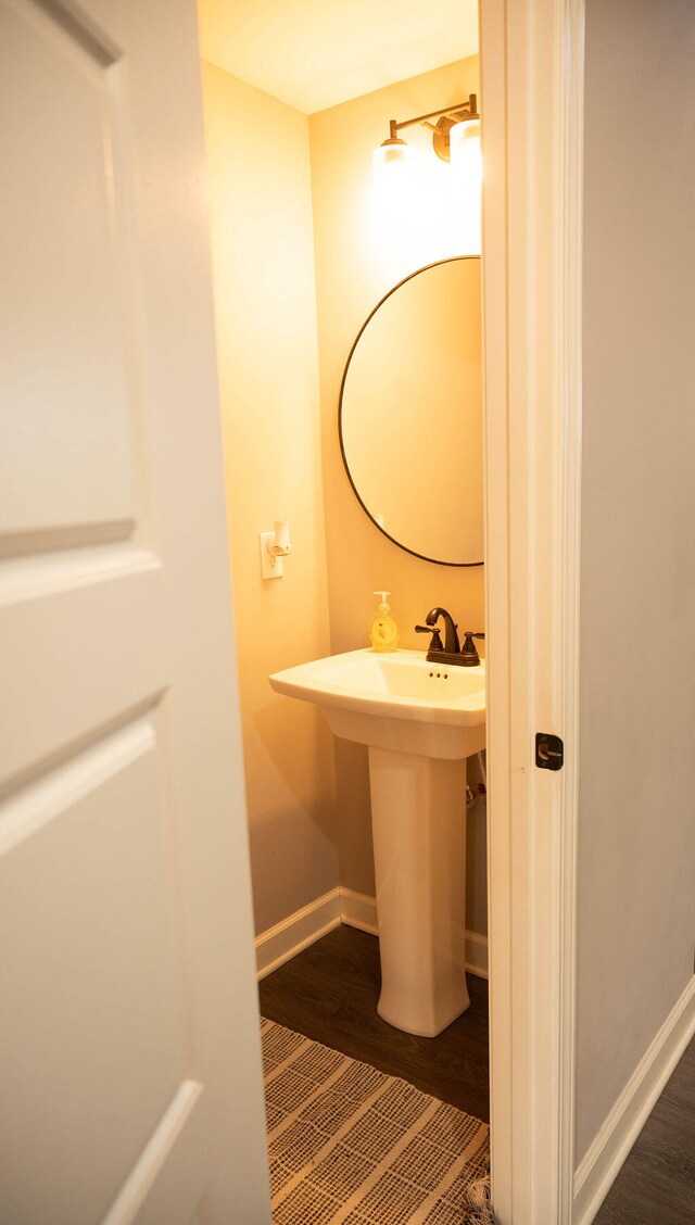 bathroom featuring hardwood / wood-style flooring