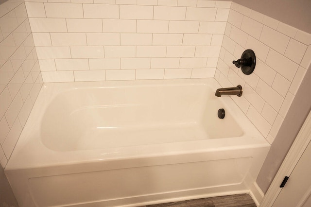 bathroom with hardwood / wood-style flooring