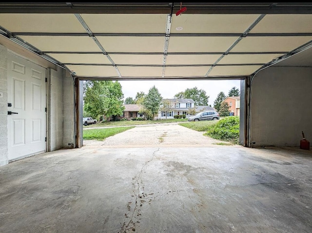 garage featuring a carport